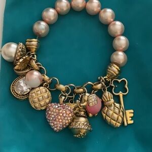 Elegant Gold and Pink Charm Bracelet